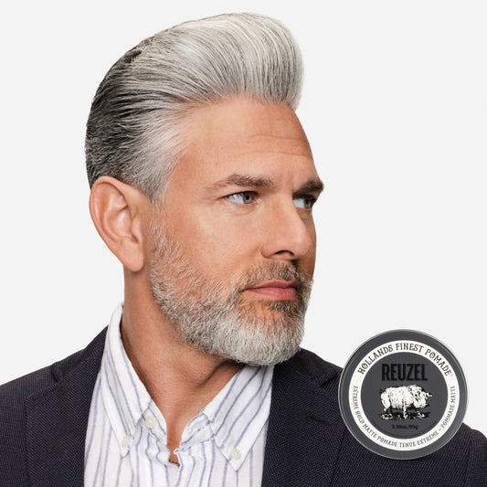Man with gray hair styled with Extreme Hold Matte Pomade by REUZEL