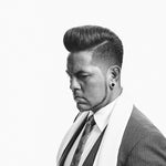 Man with healthy scalp and hair from routine use of lightweight spray tonics and traditional scalp-refreshing tonics.