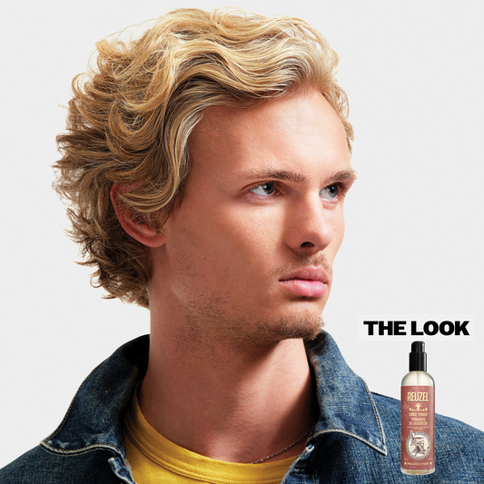 Blond model with wavy and textured hair, using Surf Tonic Salp Spray