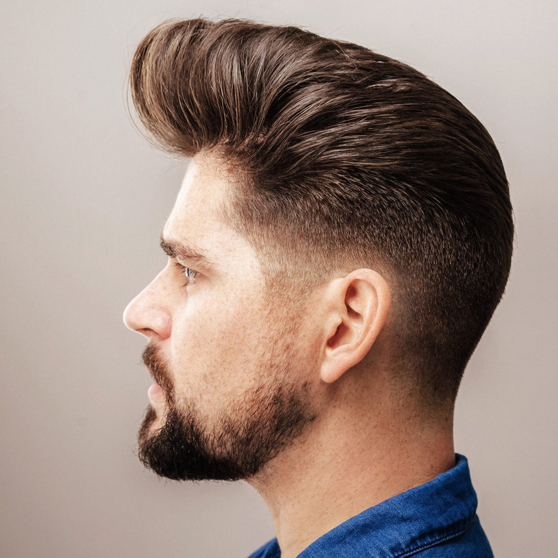 Man with a pompadour hairstyle