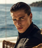 Man with a slick-back hairstyle 