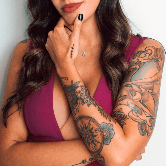 Woman with arm tattoos
