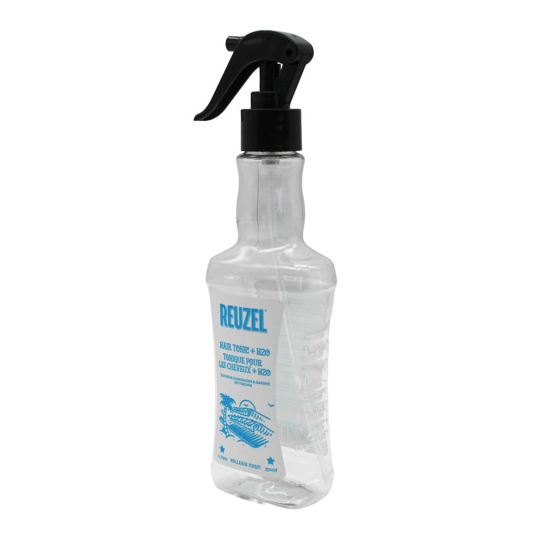 Clear spray bottle with black nozzle and Reuzel branding on a white background