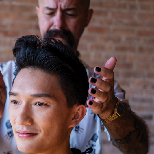 Barber doing a customers hair