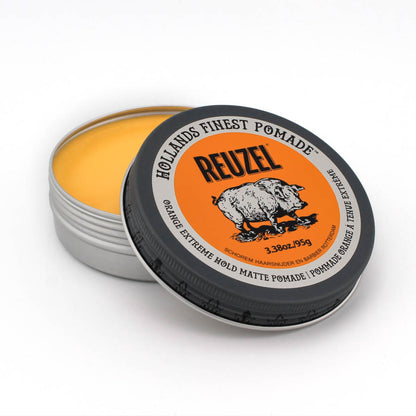 Image of REUZEL Orange Extreme Hold Matte Pomade tin opened. We turned our beloved Extreme hold matte pomade orange (which will not turn hair orange) in collaboration with IASP the international association of suicide prevention.
