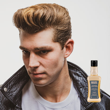 MAN WITH Cleanly shaved face using REUZEL Wood & Spice Aftershave 