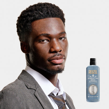 MAN WITH Cleanly shaved face using REUZEL Astringent Foam