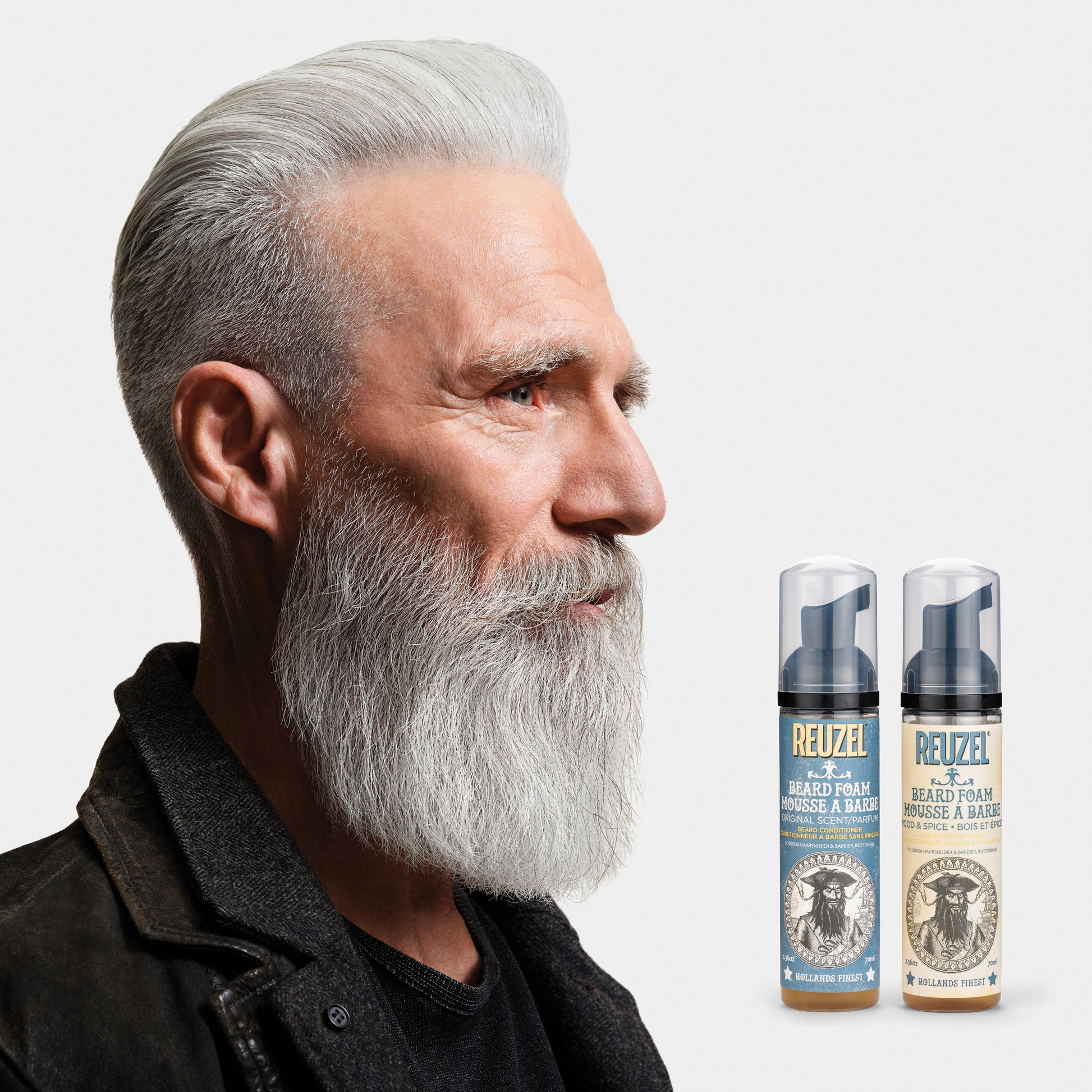 Man with grey beard styled with REUZEL Beard Foam