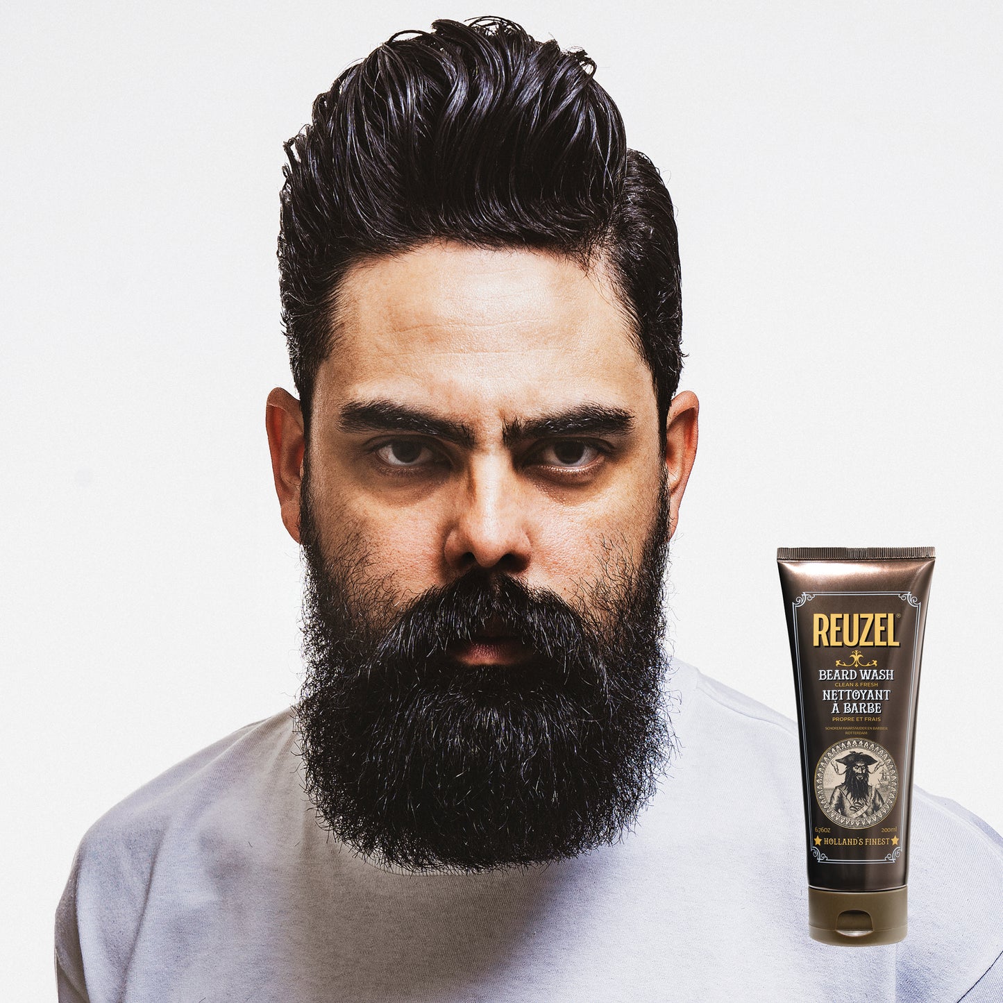 MAN WITH BEARD WASHED WITH REUZEL Beard Wash