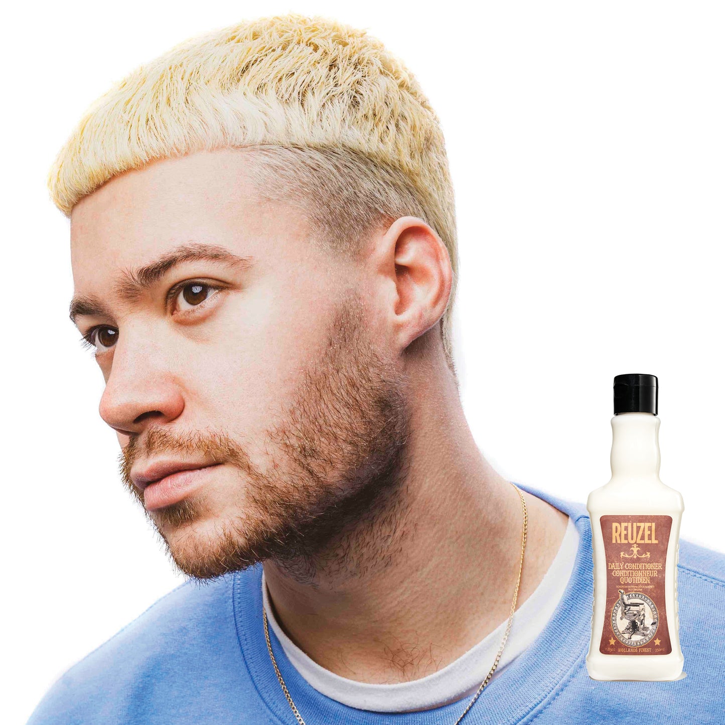 MAN WITH BLONDE HAIR STYLED WITH REUZEL Daily Conditioner