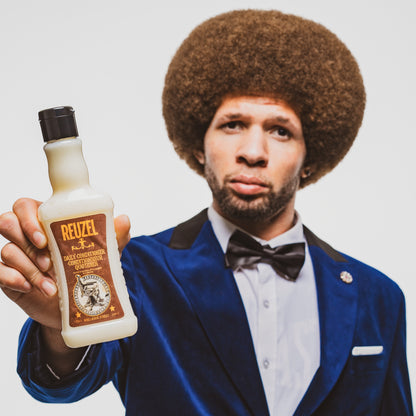 MAN WITH BROWN HAIR STYLED WITH REUZEL Daily Conditioner