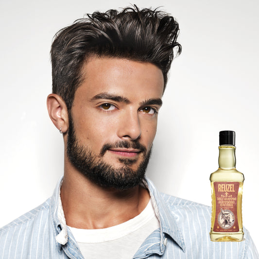 Man with brown hair styled with REUZEL Daily Shampoo