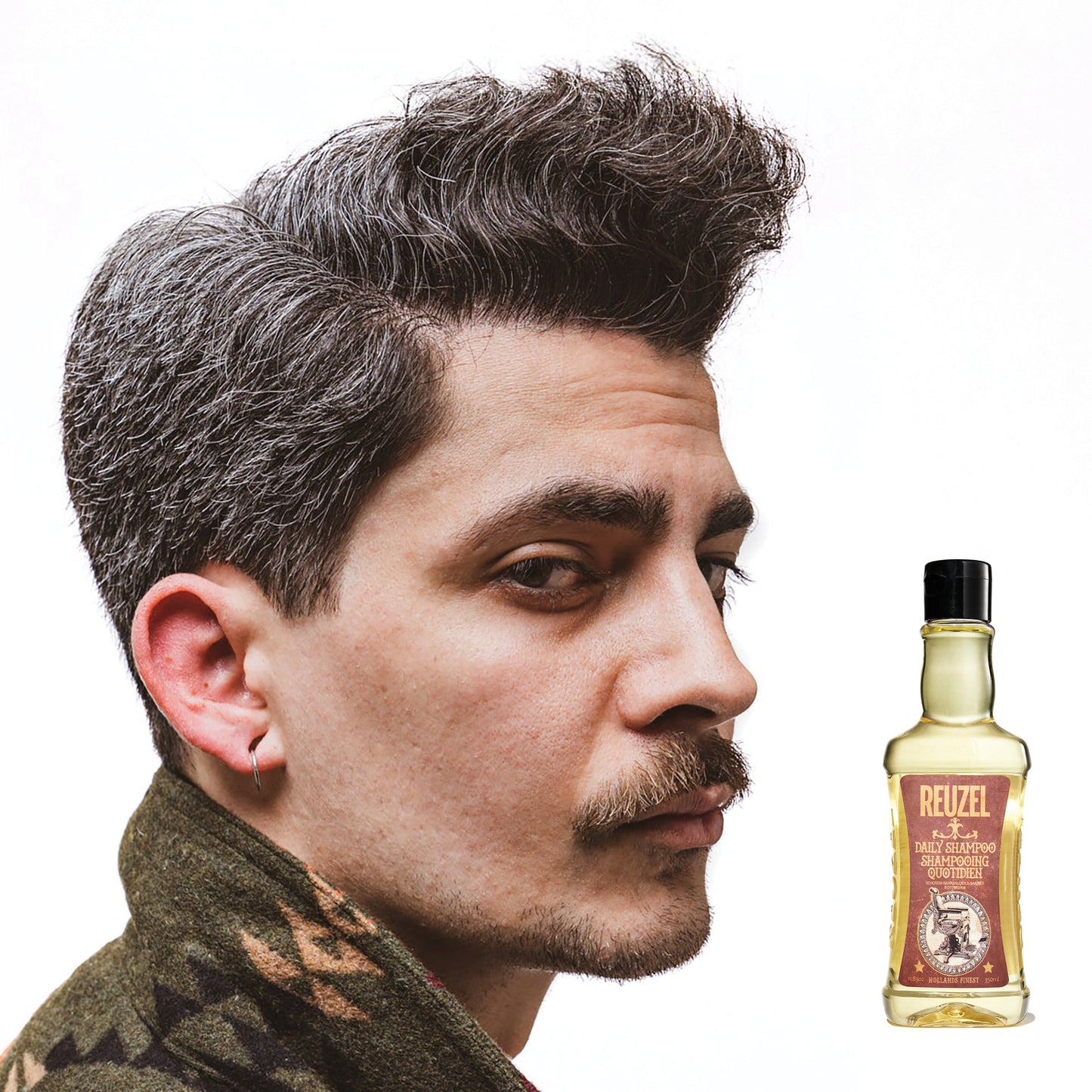 Man with brown hair styled with REUZEL Daily Shampoo