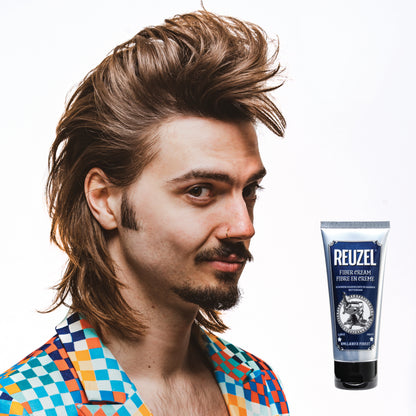 Man with brown hair styled with REUZEL Fiber Cream