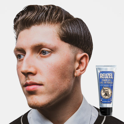 Man with brown hair styled with REUZEL Fiber Gel