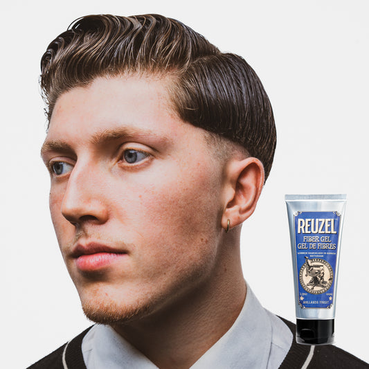 Man with brown hair styled with REUZEL Fiber Gel