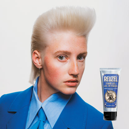 Woman with blonde hair styled with REUZEL Fiber Gel