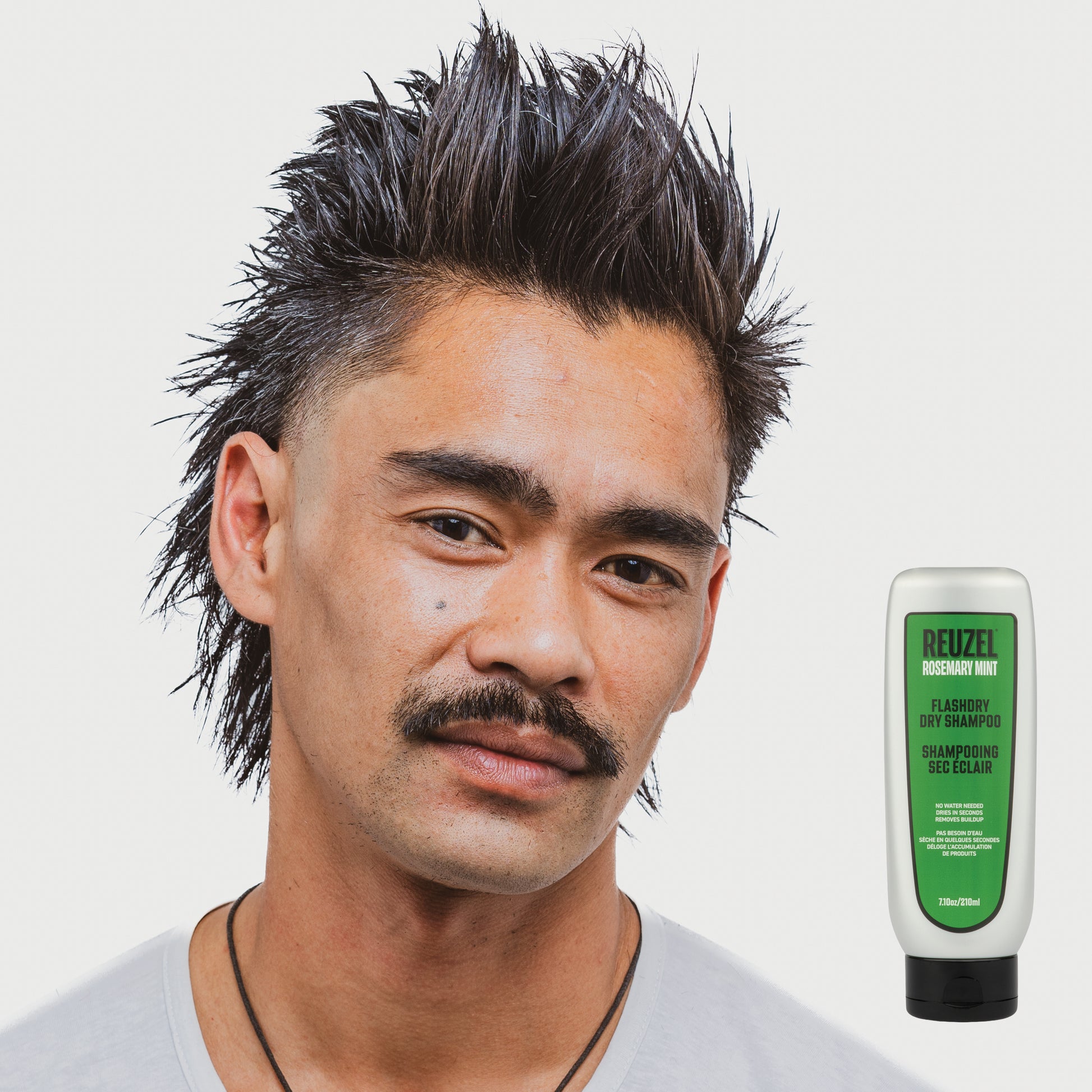 MAN with brown hair styled with REUZEL Rosemary Mint Flashdry Dry Shampoo