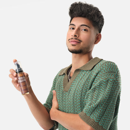 Man with Brown hair styled with REUZEL Grooming Texture Foam