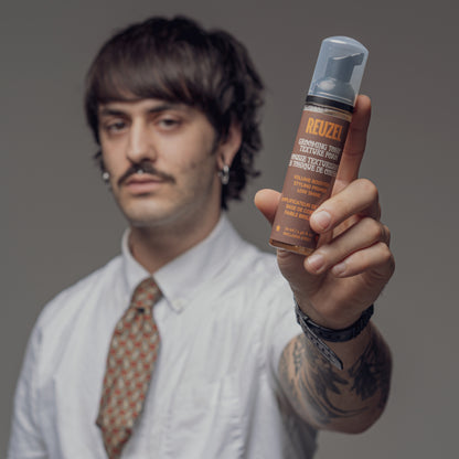Man with Brown hair styled with REUZEL Grooming Texture Foam