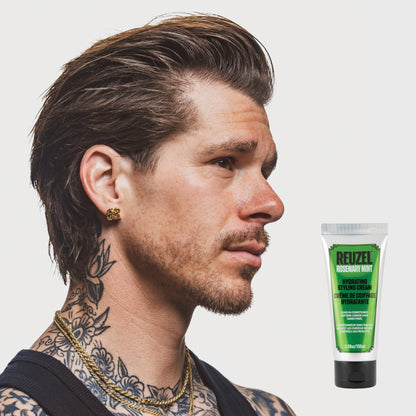 Man with brown hair styled with REUZEL Rosemary Mint Hydrating Styling Cream 