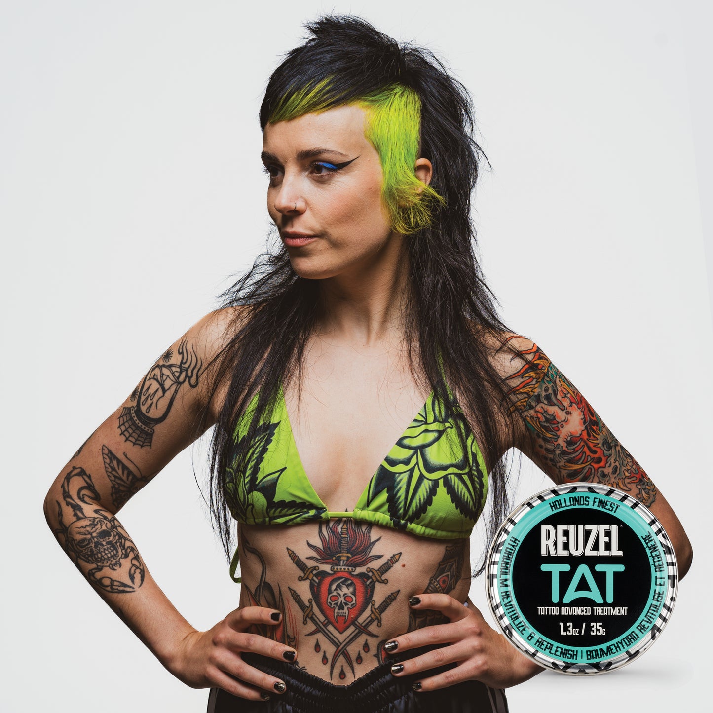 Woman with vibrant tattoos used with HYDRABALM Tattoo Balm-Tattoo Aftercare Products-REUZEL