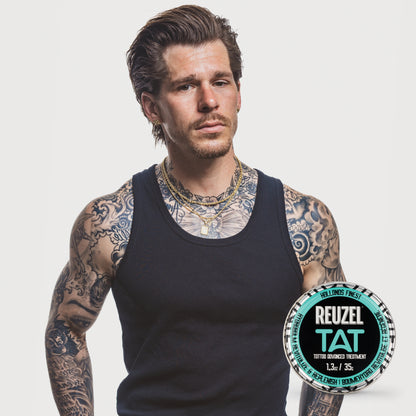 Man with vibrant tattoos used with REUZEL TAT Vivid Gel