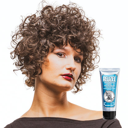 Woman with brown hair styled with  REUZEL matte styling paste 