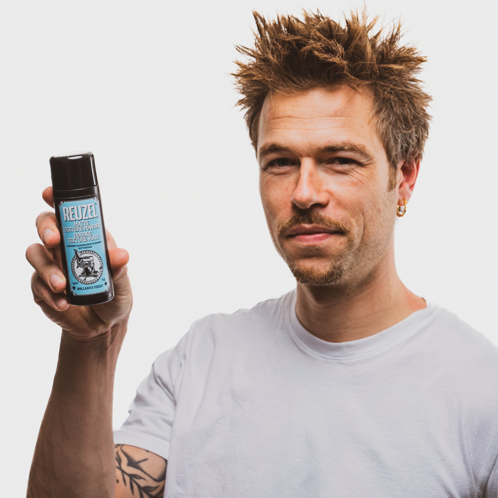 Man with Brown Hair Styled with  REUZEL Matte Texture Powder