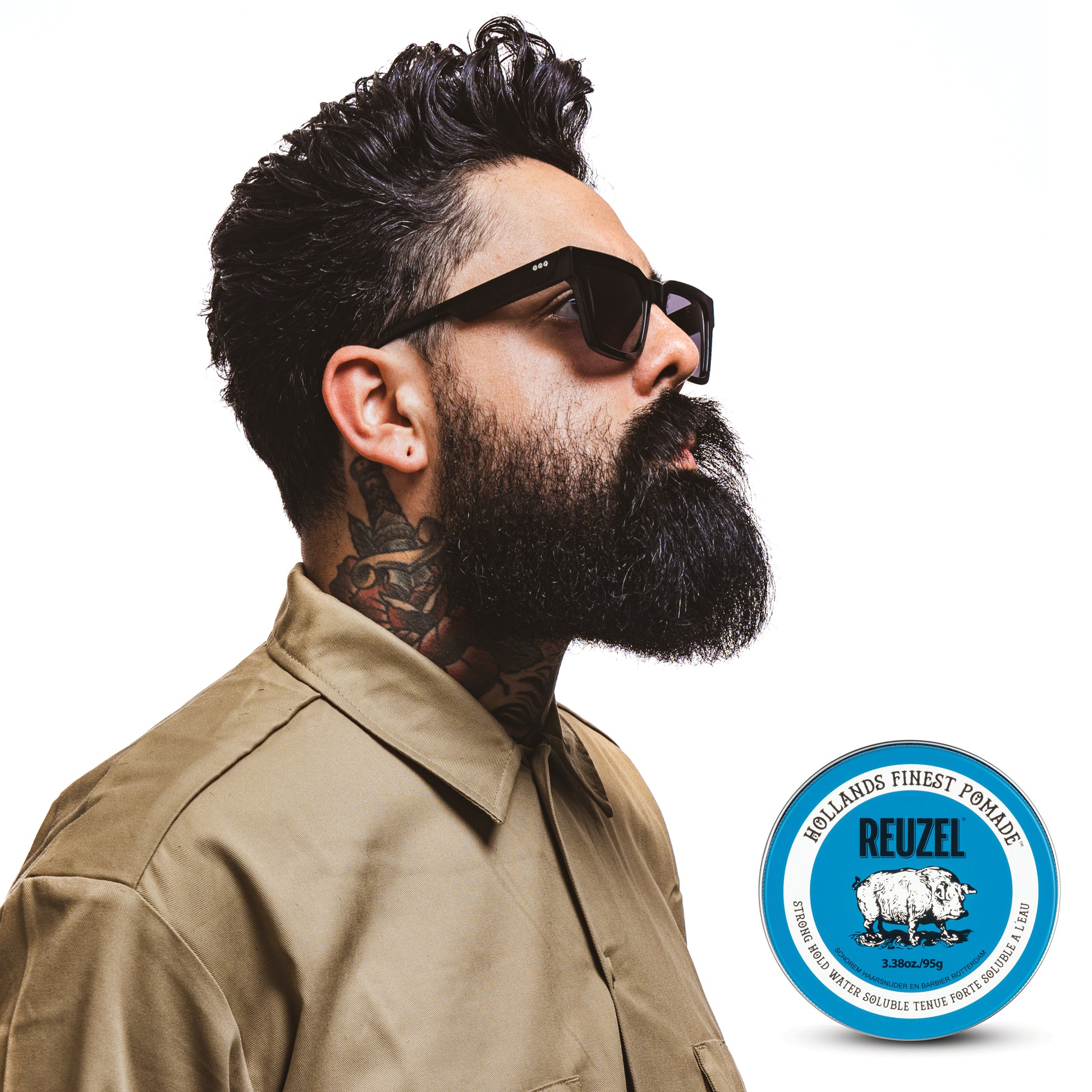 Man with Brown textured Hair Styled with REUZEL Blue Strong Hold Water Soluble Pomade