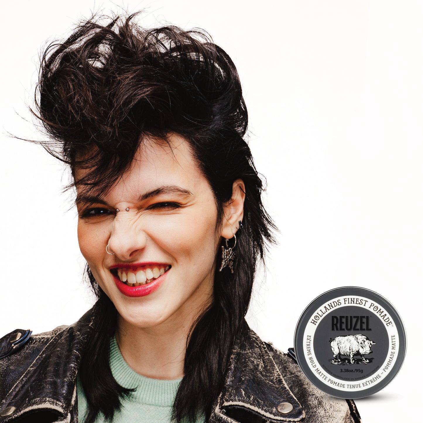 Woman with piecey hair styled with Extreme Hold Matte Pomade by REUZEL