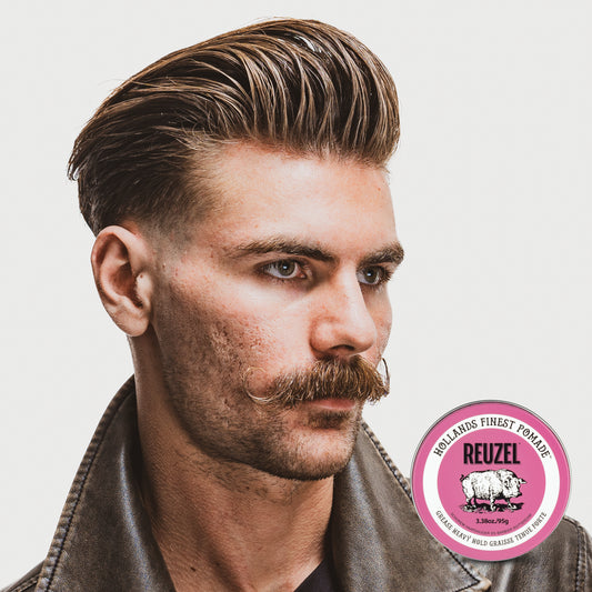 Man with brown hair styled with REUZEL Pink Grease Heavy Pomade