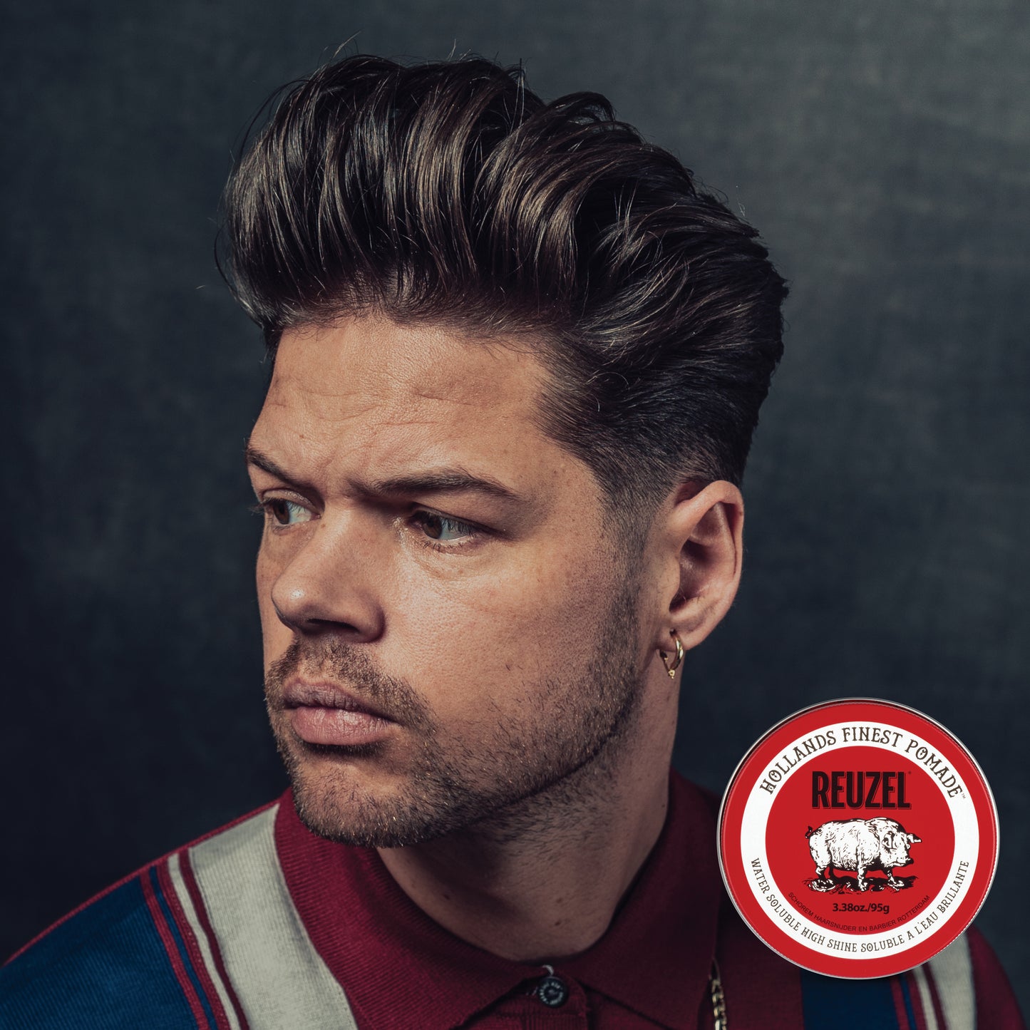 Man with brown hair styled with REUZEL Red Water-Soluble High Shine Pomade