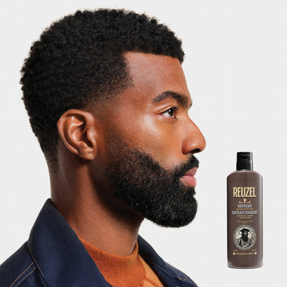 Man with beard cleaned by REUZEL REFRESH No rinse beard wash