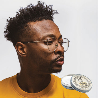 MAN WITH Cleanly shaved face using REUZEL Shave Cream