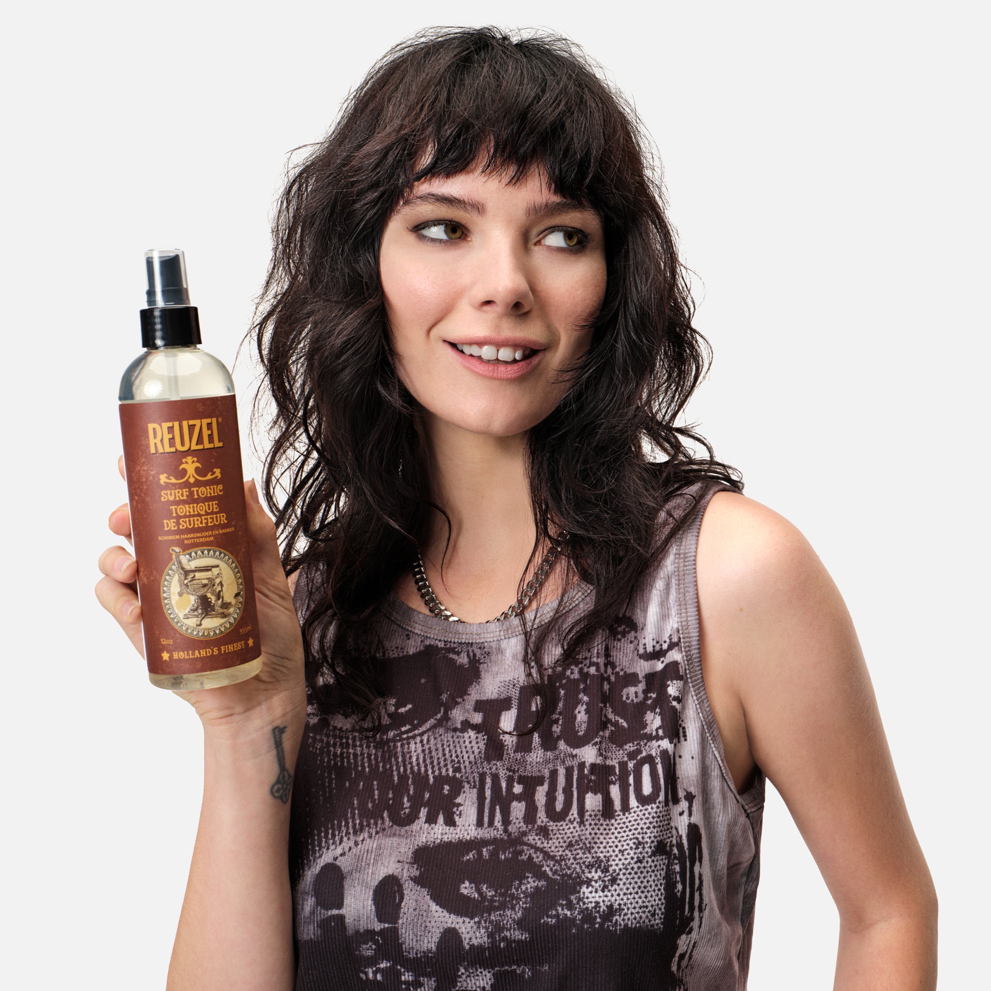 Reuzelinc Surf Tonic Salt Spray bottle, natural hair tonic with sea salt for beachy, textured hair style.
