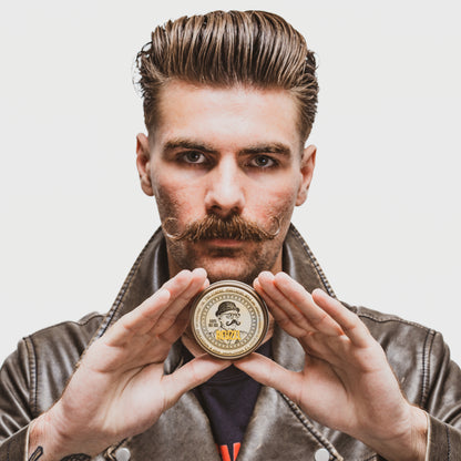 Reuzel Bourbon Sidecar Mustache Wax used on a male model with a styled mustache
