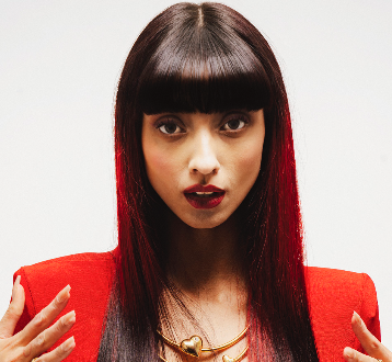 Woman with straight dyed dark red hair