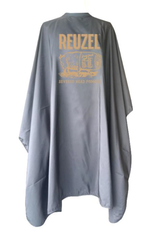 Reuzel Severed Head Cape featuring a graphic design of a severed head on a black cape for grooming or barber use.